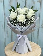 Букет цветов из:  Розы в им 9 Января