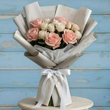 Букет цветов из:  Розы в им 9 Января